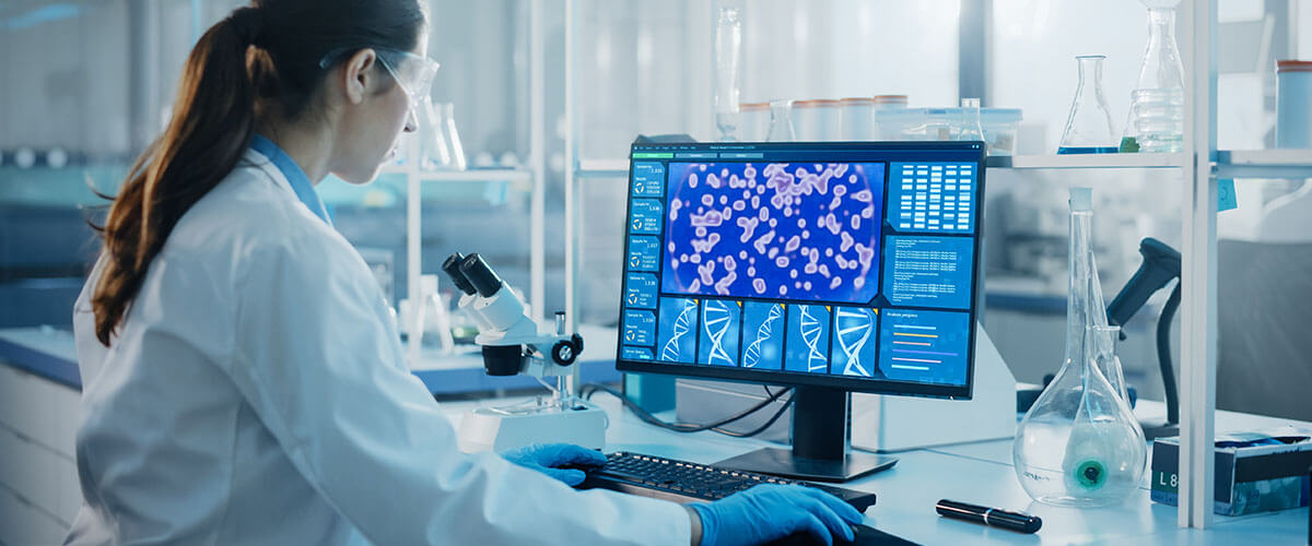 Scientist examining scientific data on computer screen
